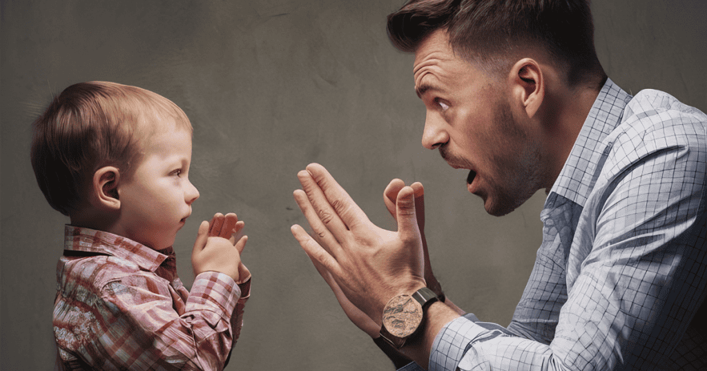 A man gestures intensely while looming over a small, silent child, capturing a moment where a parent’s overwhelming presence eclipses the child’s own voice.