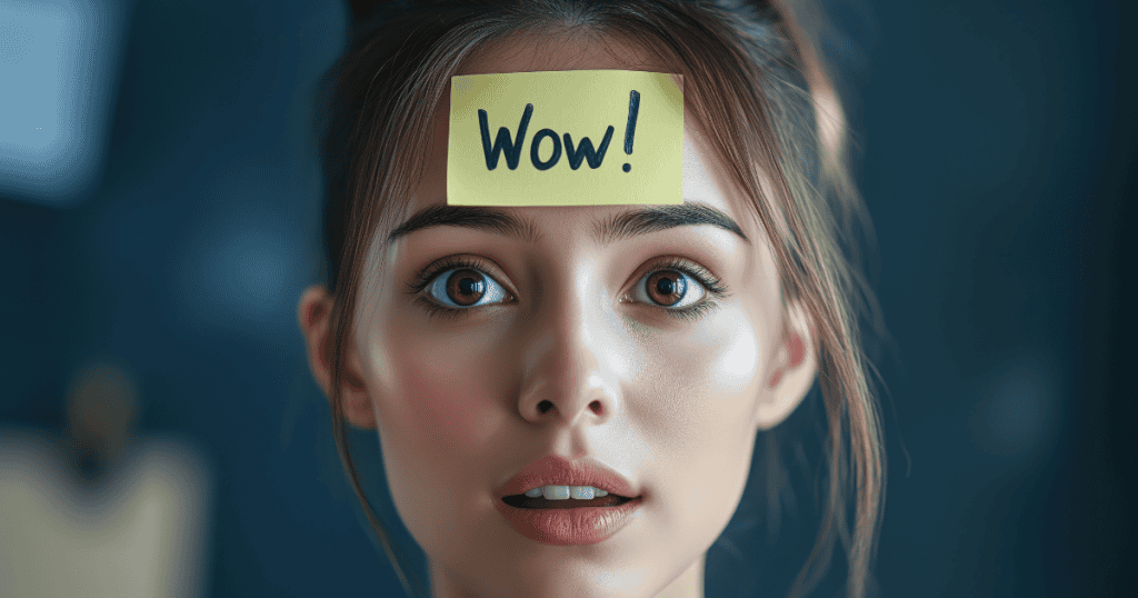 A woman stares wide-eyed with a "Wow!" sticky note on her forehead, capturing the shock of being abruptly labeled by another.