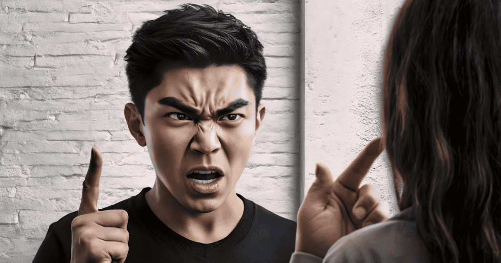 A man winces and snarls in a display of vocal frustration, embodying the volatile reactions triggered by a perceived lack of attention.