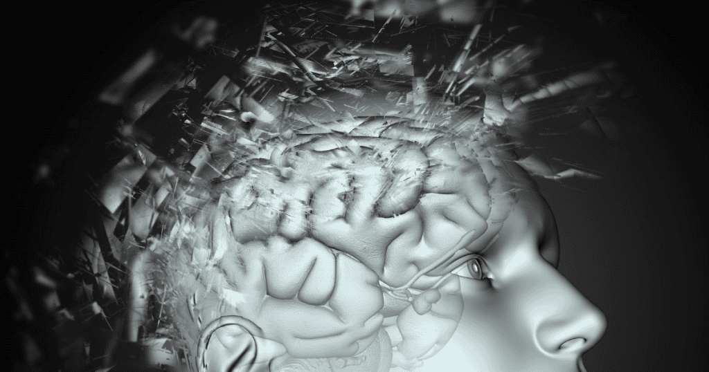 A digital rendering of a human brain fracturing into sharp, glass-like shards, illustrating a cognitive architecture that perceives simple interactions as destructive assaults.